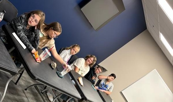 teens conducting a meeting